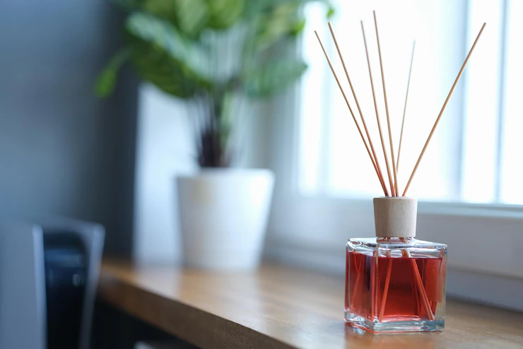 reed-air-freshener-wooden-window-sill-indoors_151013-41036